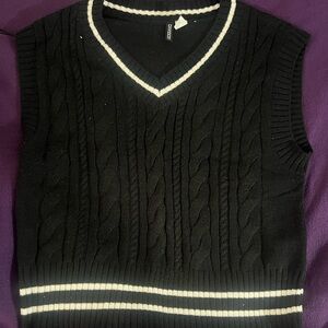 Black with white striped vest